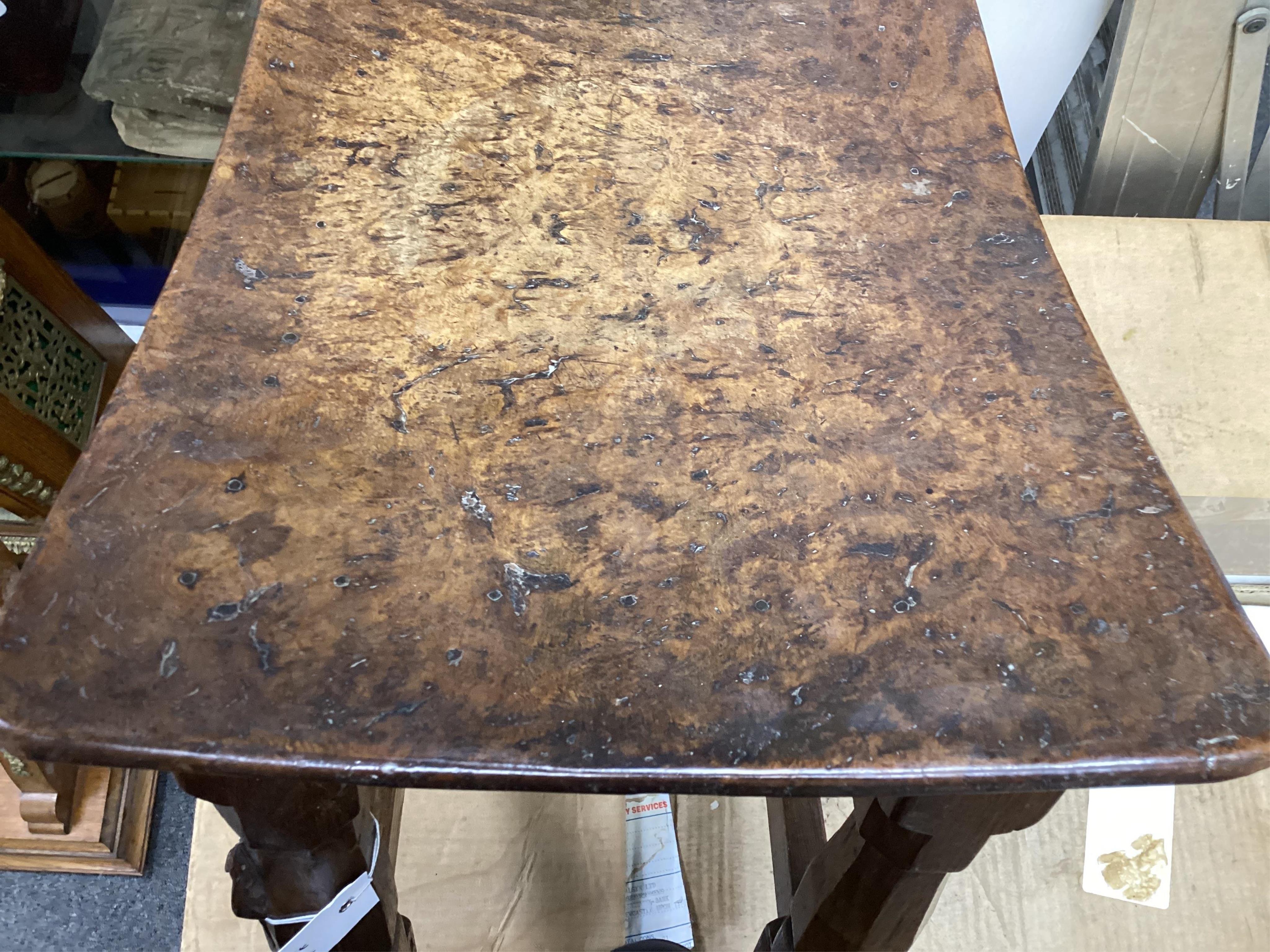 A pair of Robert 'Mouseman' Thompson burr oak stools, 1930s